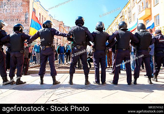 Samara, Russia - May 5, 2018: Police officers block an Leningradskaya street during an opposition protest rally ahead of President Vladimir Putin's inauguration...