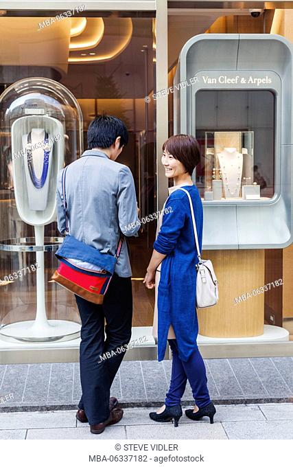 Japan, Hoshu, Tokyo, Ginza, Young Couple Window Shopping Outside Van Cleef & Arpels