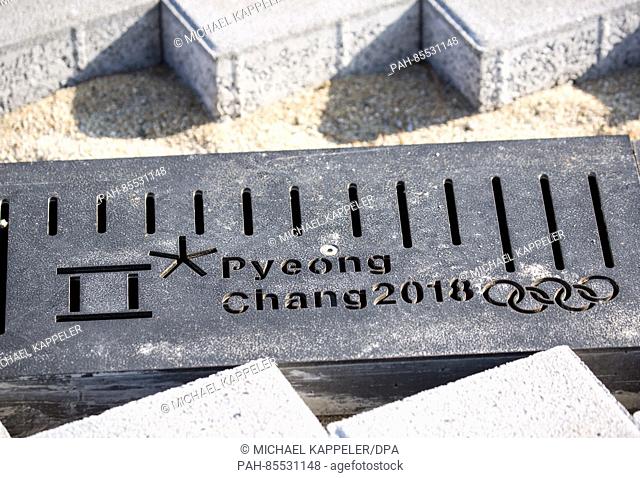 The logo of the Winter Olympics is already laid into the ground at the construction site of the Ice hockey stadium in the region Pyeongchang, South Korea