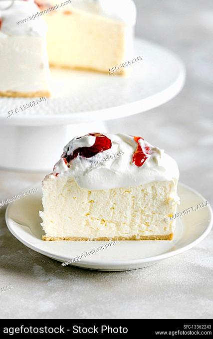 Vanilla coconut cheesecake with strawberry and whipped cream