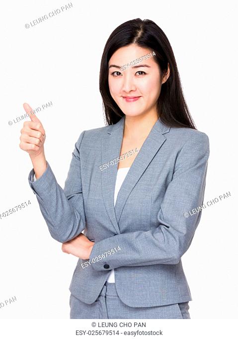 Businesswoman with thumb up gesture