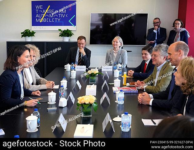 15 April 2023, China, Peking: Foreign Minister Annalena Baerbock (l, Bündnis 90/Die Grünen) visits Volkswagen's research and development center
