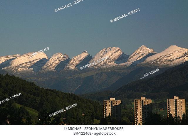 The striking features of the Churfirsten mountain peaks with the old buildings of Wattwil, St. Gallen, Switzerland