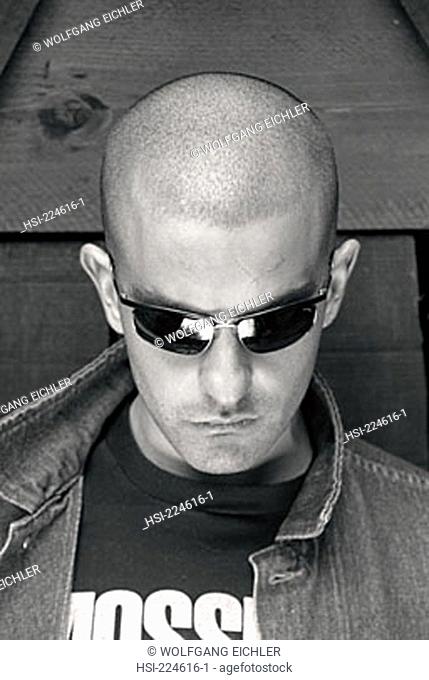 man, portrait, face, alternative hairstyle, shaved head, sunglasses, sunshades, sunspecs, black & white