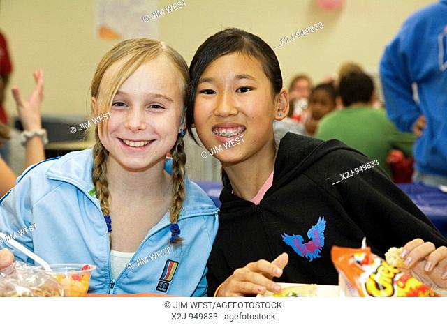 Lansing, Michigan - Students from diverse backgrounds get to know each other at lunch hour on Mix It Up Day at Waverly Middle School  Mix It Up Day is a...