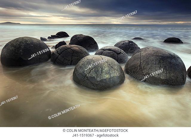 Moeraki boulders, sombre winter dawn, near Oamaru, Otago, South Island, New Zealand