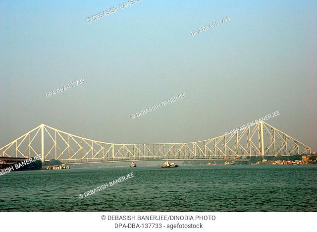 Howrah bridge over Hooghly river ; Calcutta ; West Bengal ; India