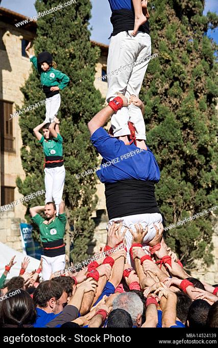 Castellers performing in Plaza Octavia in Sant Cugat del Valles in the province of Barcelona in Catalonia Spain