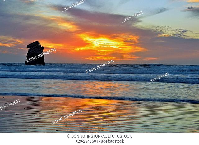 Morro Rock and beach at sunset, Morro Bay, California, USA