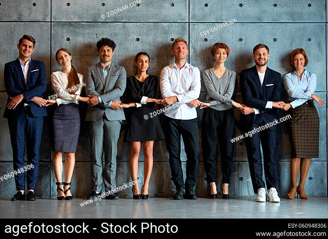 Multiethnic business people group team portrait cooperation success concept, businesspeople holding hands linked together