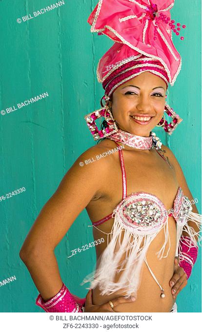 Trinidad Cuba beautiful dancer in costume portrait with headress and color from tourist show 12