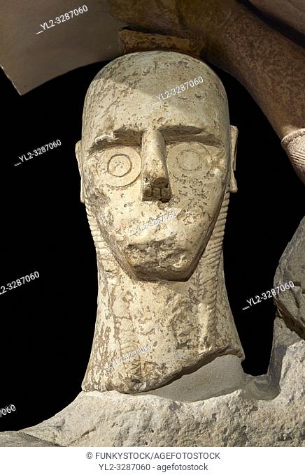 Close up of head of 9th century BC Giants of Mont'e Prama Nuragic stone statue of a boxer, Mont'e Prama archaeological site, Cabras. 2014 excavation