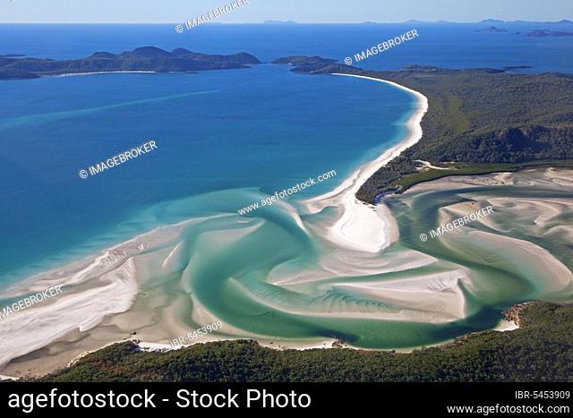 Area view of white sandy beaches and turquoise waters of Whitehaven Beach on Whitsunday Island in the Coral Sea, Queensland, Australia, Oceania