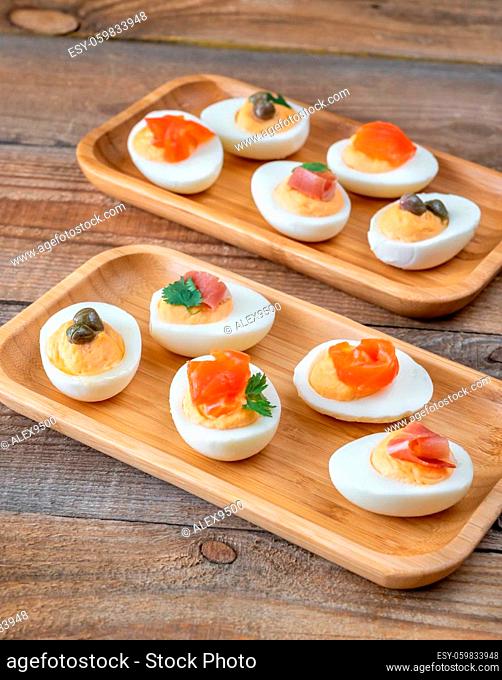 Sriracha deviled eggs with different toppings