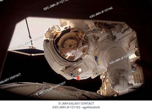 Astronaut Peggy A. Whitson, Expedition 16 commander, participates in a session of extravehicular activity (EVA) as construction continues on the International...