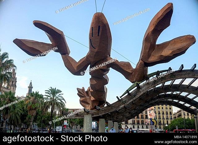 gambrinus - giant happiest lobster sculpture with big pinching claws and a cheeky smile on passeig de colom at the port olympic, barcelona, spain