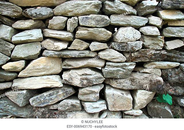 Texture of old stone wall for background