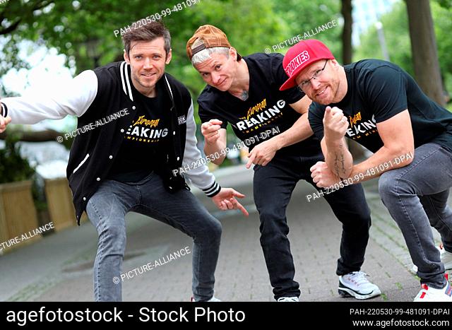 30 May 2022, Saxony-Anhalt, Magdeburg: Konstantin Ernst, Farma Ribeiro and Niels Klebe from the ""Da Rookies"" pose for a press photo during a press conference...
