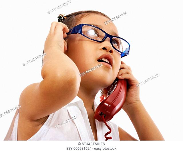 Young Girl On The Phone Role Playing At Being A Secretary