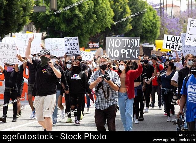 Los Angeles, CA - June 2, 2020: Demonstrators attend the George Floyd Black Lives Matter Protest on June 2, 2020 on Hollywood Blvd in Los Angeles, California