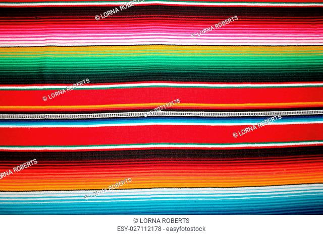 Mexico poncho serape traditional cinco de mayo rug poncho fiesta background with stripes copy space