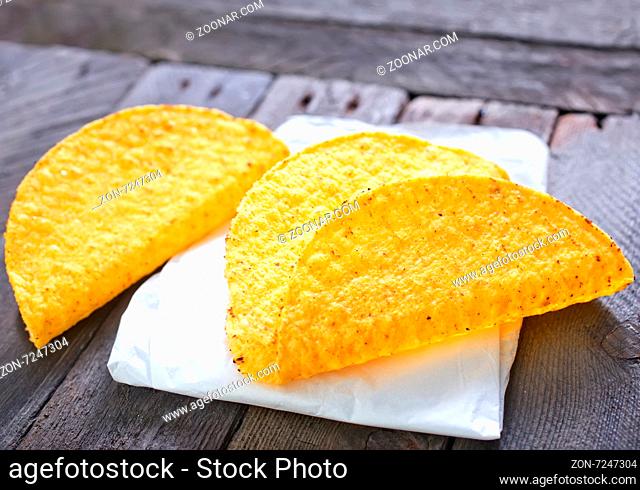 taco or tortilla shells on the wooden table