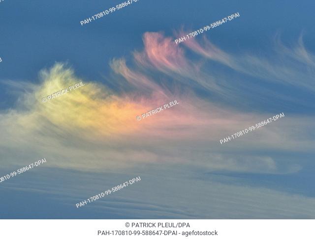 A so-called parhelion, a halo phenomenon, seen in the clouds above Lebus, Germany, 09 August 2017. Parhelia are light spots at a distance of about 22 degrees...