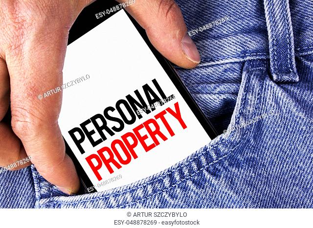 Conceptual hand writing showing Personal Property. Business photo showcasing Belongings possessions assets private individual owner written Mobile phone holding...