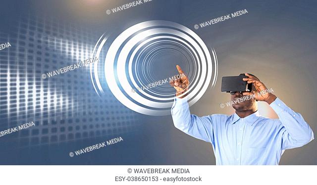 Man touching circle interface with virtual reality headset