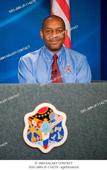 Astronaut Robert L. Satcher Jr., STS-129 mission specialist, fields a question from a reporter during an STS-129 preflight press briefing at NASA's Johnson...