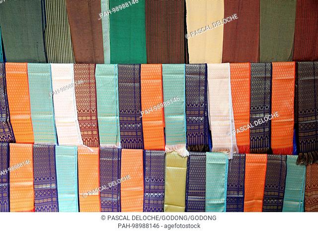 Traditional silk scarves for sale on a market. Dalat. Vietnam. | usage worldwide. - Dalat/Lam Dong/Vietnam