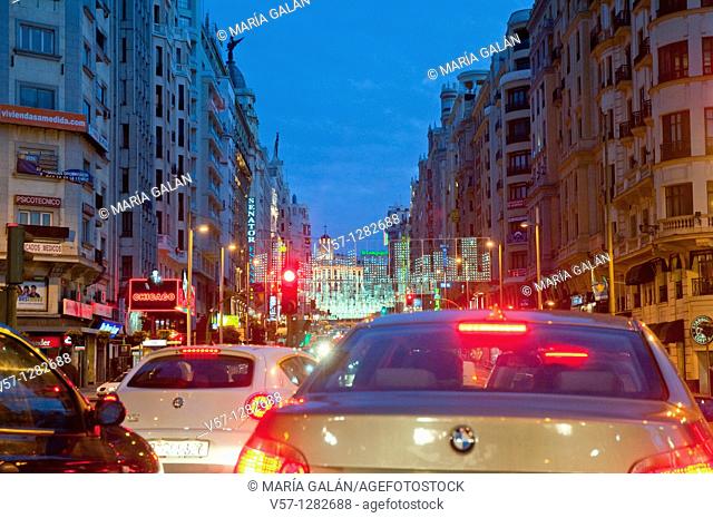 Traffic jam in Gran Vía Street at Christmas time, night view. Madrid, Spain