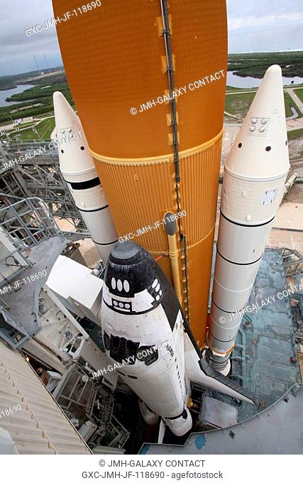 Space shuttle Atlantis is revealed on Launch Pad 39A at NASA's Kennedy Space Center in Florida following the move of the rotating service structure (RSS)