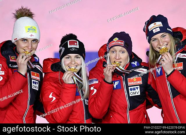 27 February 2021, Bavaria, Oberstdorf: Nordic Skiing: World Championships, Ski Jumping - Team Jumping, Women. The gold medal winners Sophie Sorschag