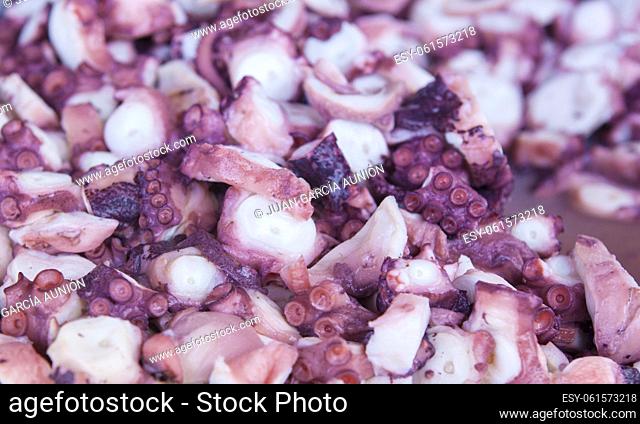 Boiled and chilled sliced of octopus. Galician-Style tapa