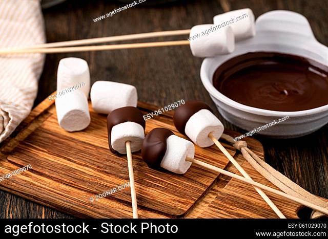 marshmallow on old wooden table