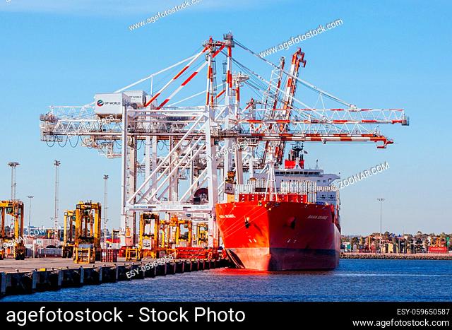 Melbourne, Australia - 17 December 2013: Coode Island shipping port with boats being unloaded in Melbourne, Victoria, Australia