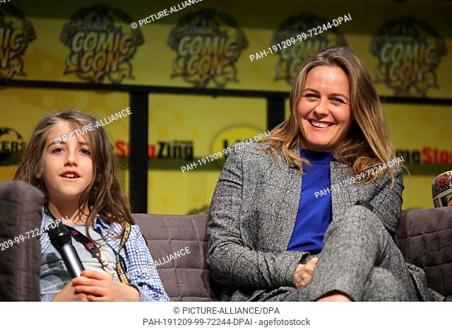 07 December 2019, North Rhine-Westphalia, Dortmund: German Comic Con Dortmund: Alicia Silverstone with her son Bear at the German Comic Con