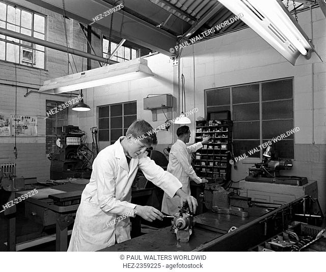 Apprentice at work, Globe & Simpson auto electrical workshop, Nottingham, Nottinghamshire, 1961. Sheffield-based Globe & Simpson ran an auto electrical...