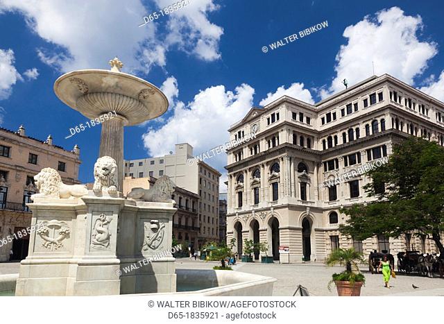 Cuba, Havana, Havana Vieja, Plaza de San Francisco de Asis, Lonja del Commercio building and Fuente de los Leones fountain