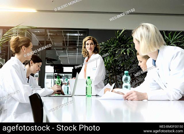 Female doctors having a meeting