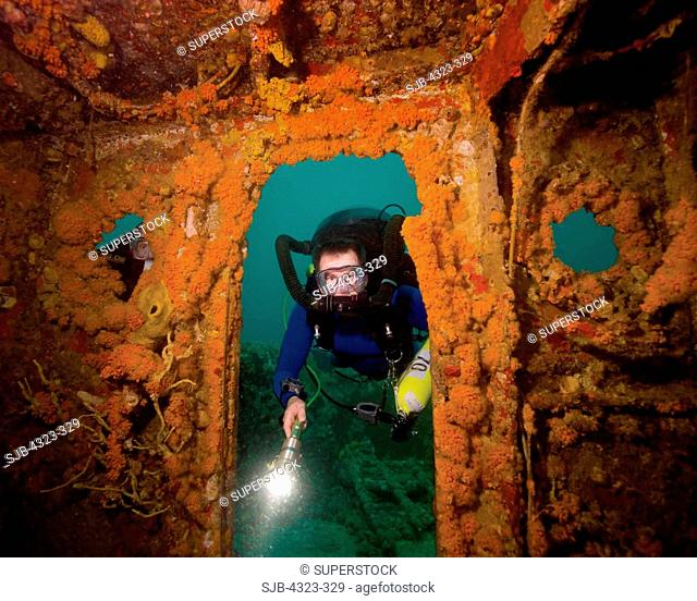 Diver Using Rebreather on Shipwreck