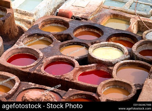 Tanneries of Fes, Morocco, Africa. Old tanks with color paint for leather