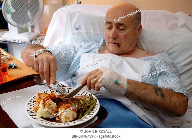 Hospital patient eating dinner