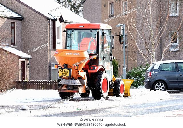 West Lothian Council worker were using small snowploughs and gritters to clear paths of the snow as blizzards hit Scotland