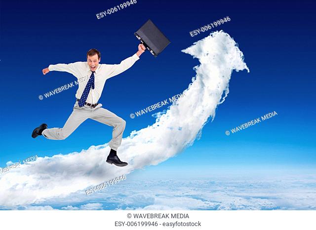 Composite image of cheerful jumping businessman with his suitcase