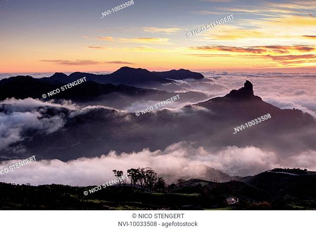 Roque Bentayga above the clouds at sunset, Gran Canaria, Canary Islands, Spain