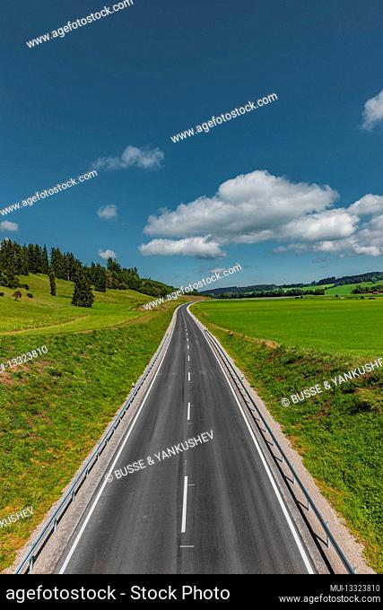 German Autobahn through green landscapes