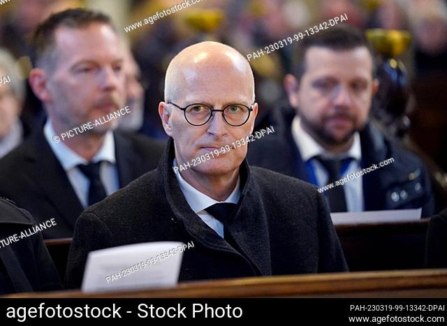 19 March 2023, Hamburg: Peter Tschentscher (SPD), First Mayor of Hamburg, follows the memorial service for the victims of the rampage at the Jehovah's Witnesses...
