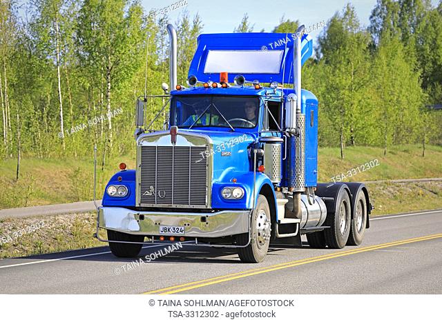 Salo, Finland. May 18, 2019. Blue Kenworth W900 truck tractor year 1978 on the road on the popular event Salon Maisema Cruising 2019